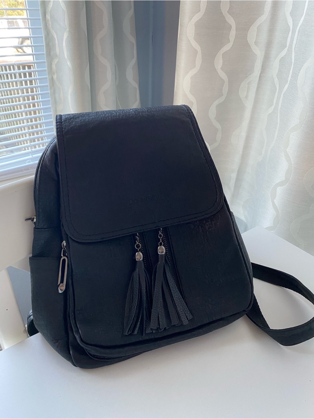 Amazon Black Tassel Flap Backpack Purse